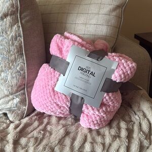 Pink fluffy throw on blanket or baby blanket